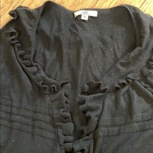 Red haute sweater with frills in front NWOT